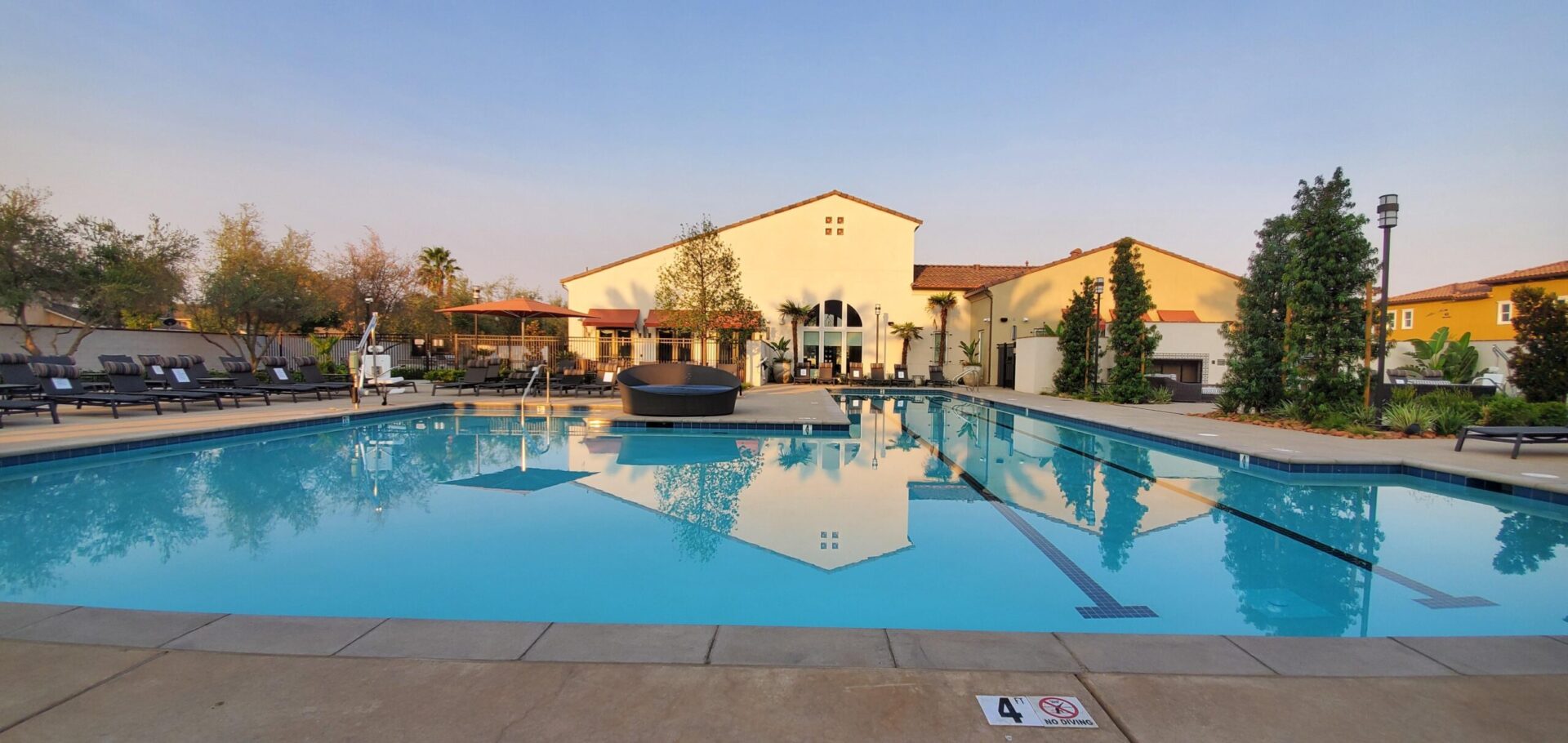 A large swimming pool with a lot of water